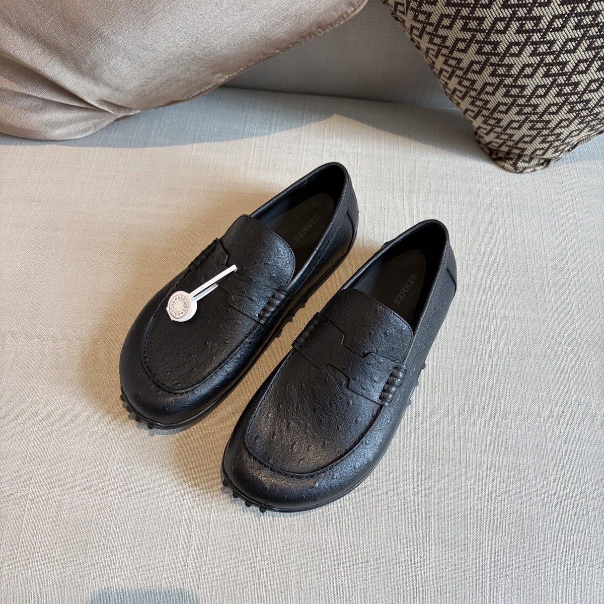 Hermès Textured Studded-Sole Loafers — side