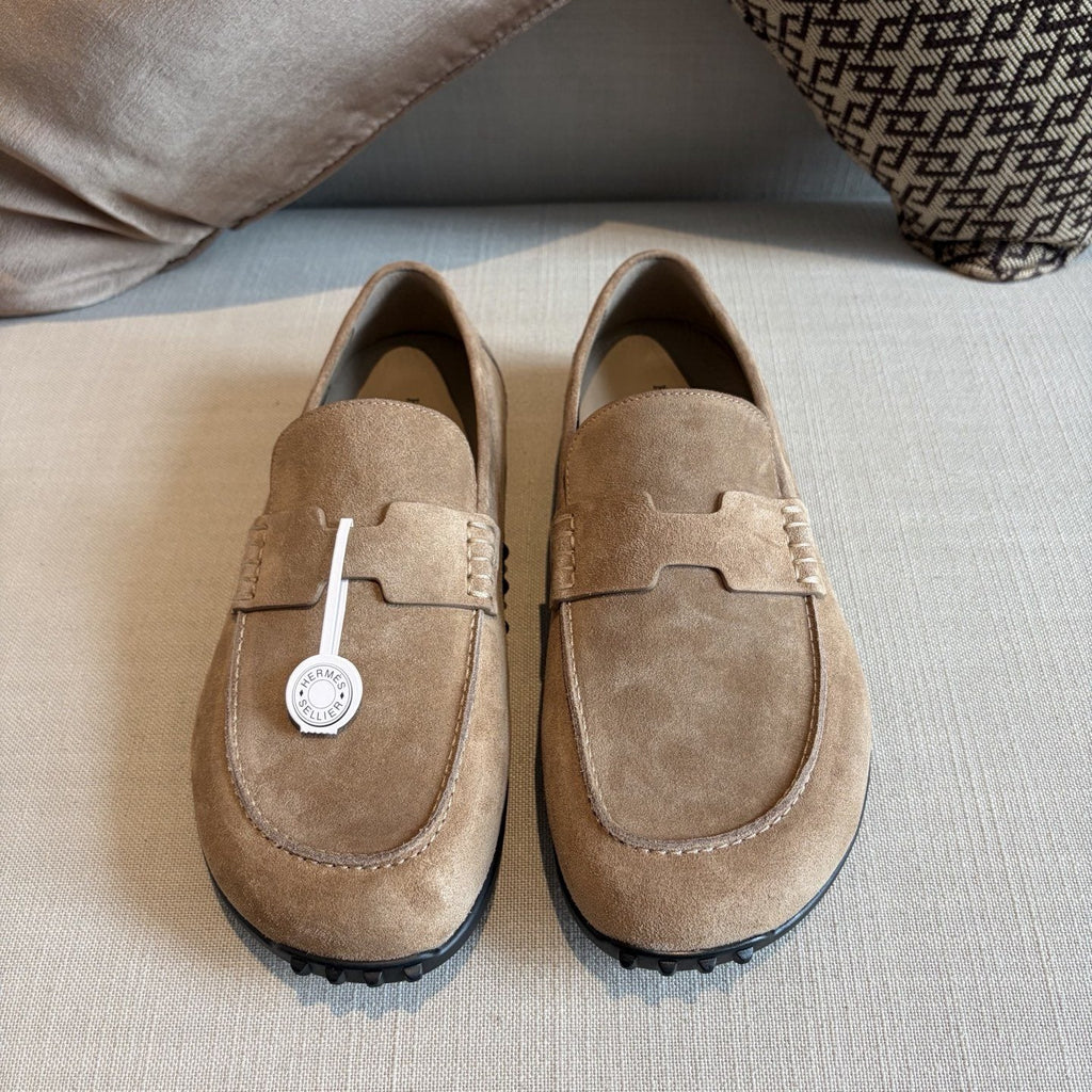 Hermès Textured Studded-Sole Loafers — hero