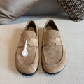 Hermès Textured Studded-Sole Loafers — hero
