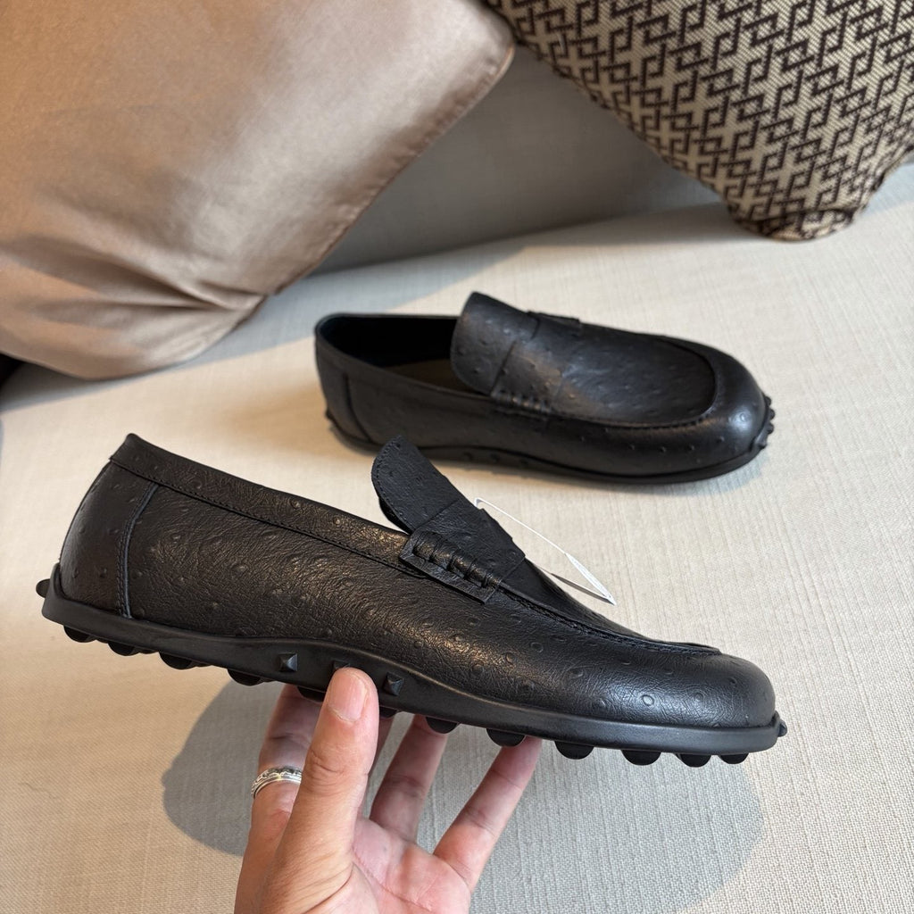 Hermès Textured Studded-Sole Loafers — side