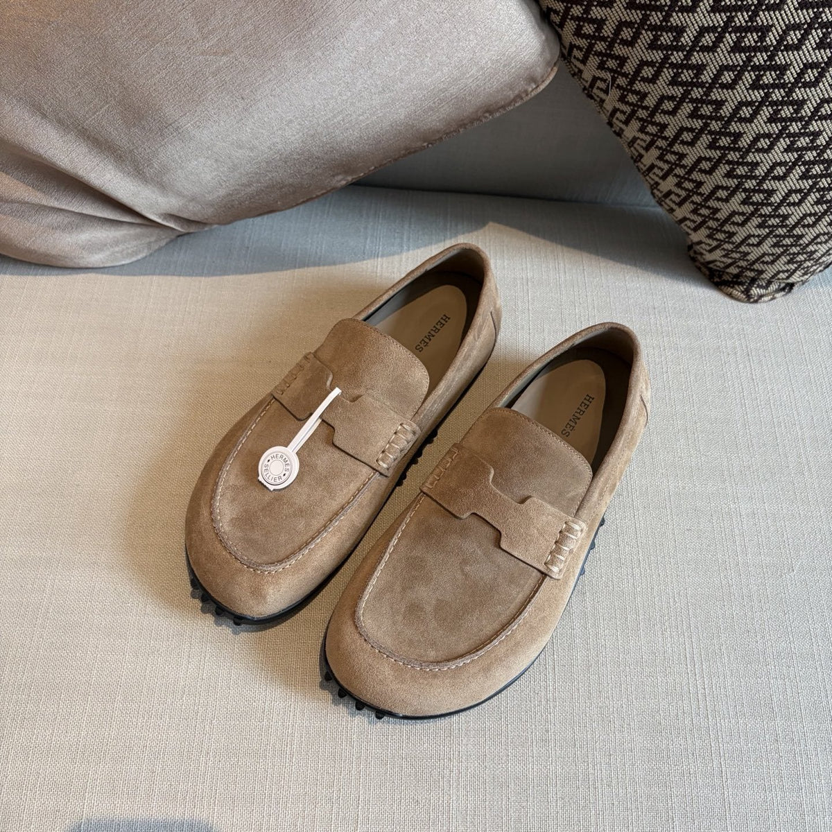 Hermès Textured Studded-Sole Loafers — front