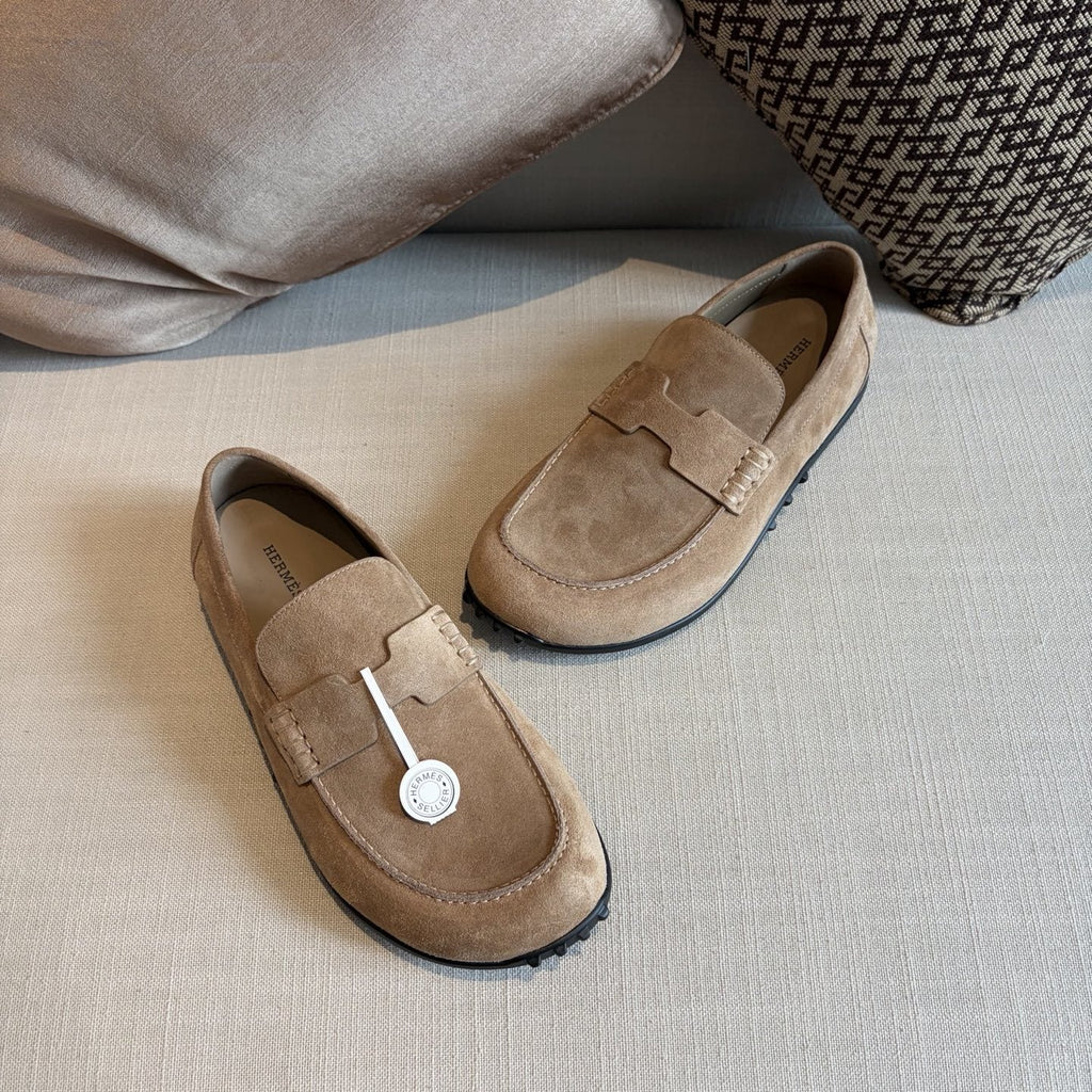 Hermès Textured Studded-Sole Loafers — front