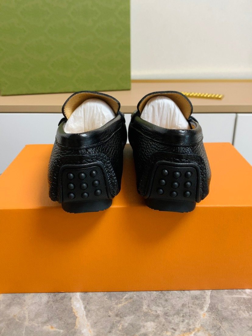 Louis Vuitton Textured Moc-Toe Loafers — back