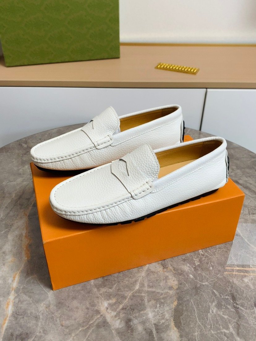 Louis Vuitton Textured Moc-Toe Loafers — front