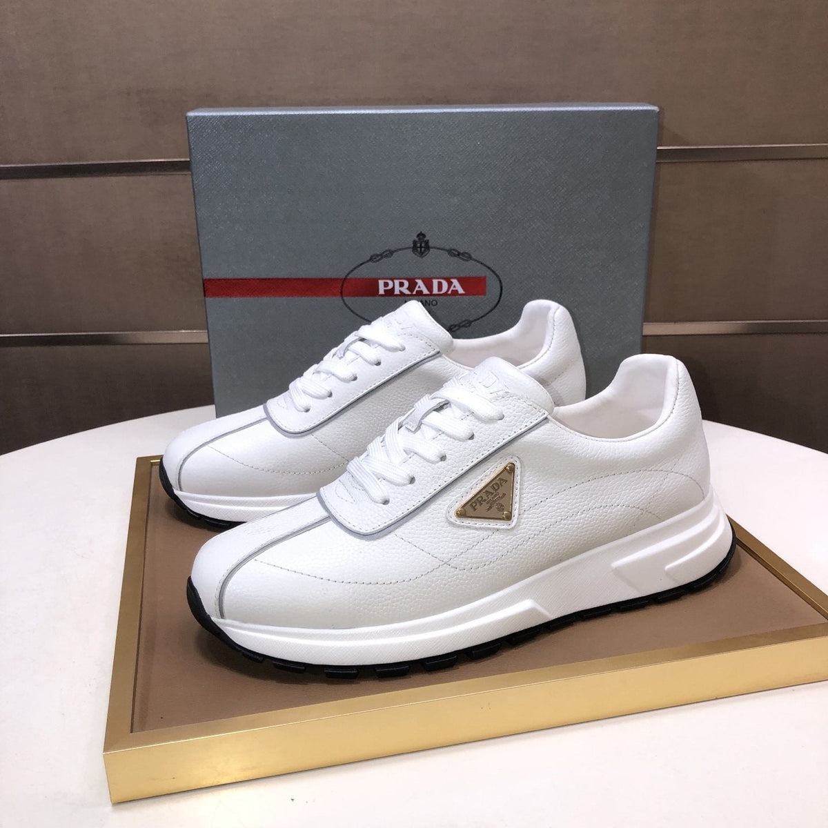 Prada Triangle Plaque Low-Top Sneakers — front