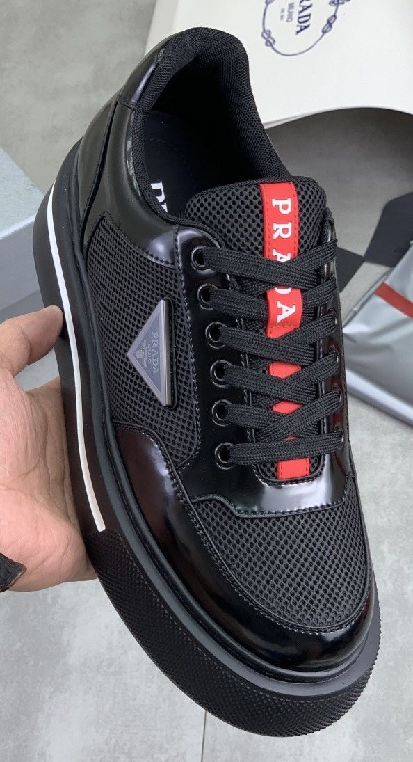 Prada Triangle Patch Low-Top Sneakers — front
