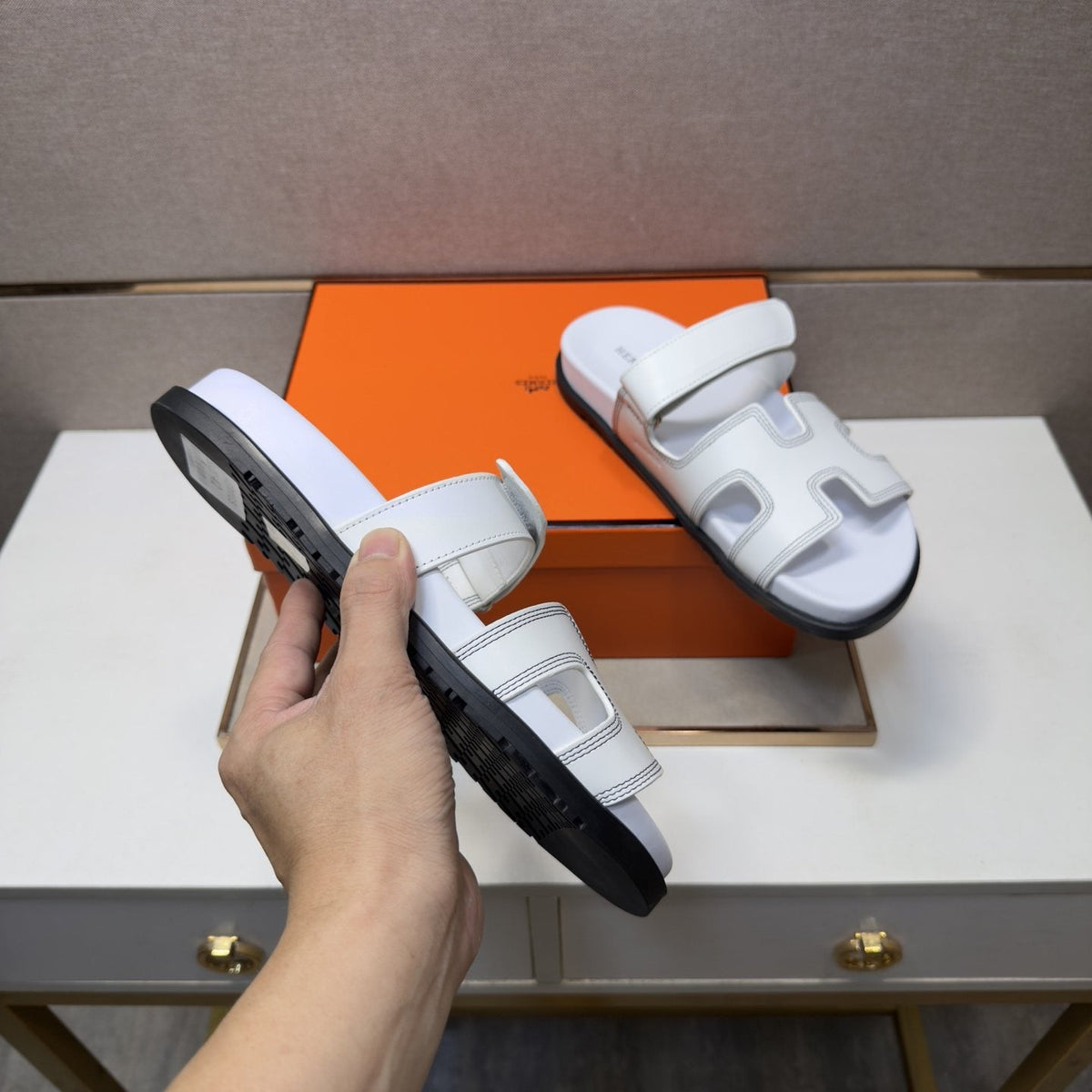 Hermès Cutout Slide Sandals — model