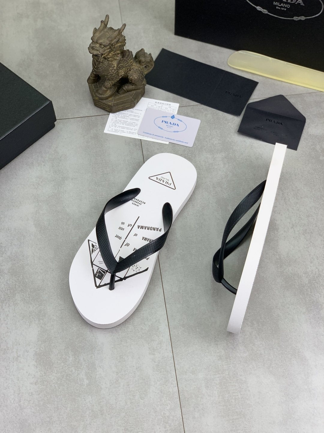 Prada Black Strap White Flip Flops — side