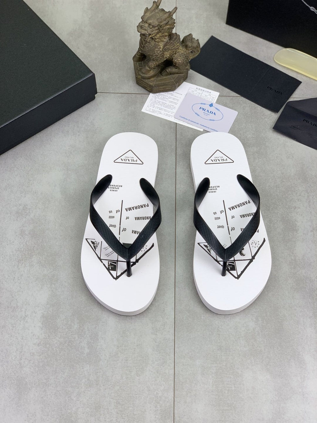 Prada Black Strap White Flip Flops — hero