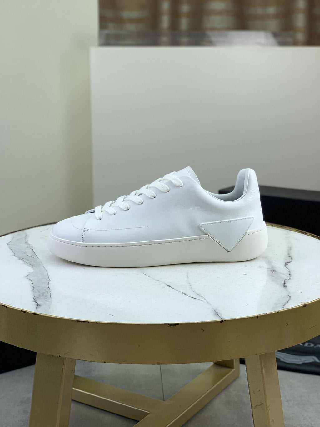 PRADA Triangle Accent Low-Top Sneakers — hero