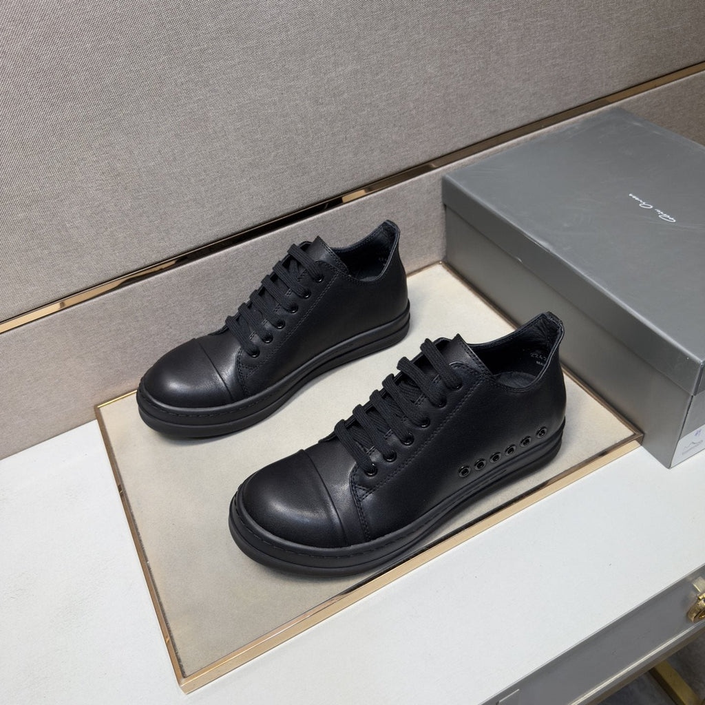 Black and Off-White Low-Top Sneakers — front