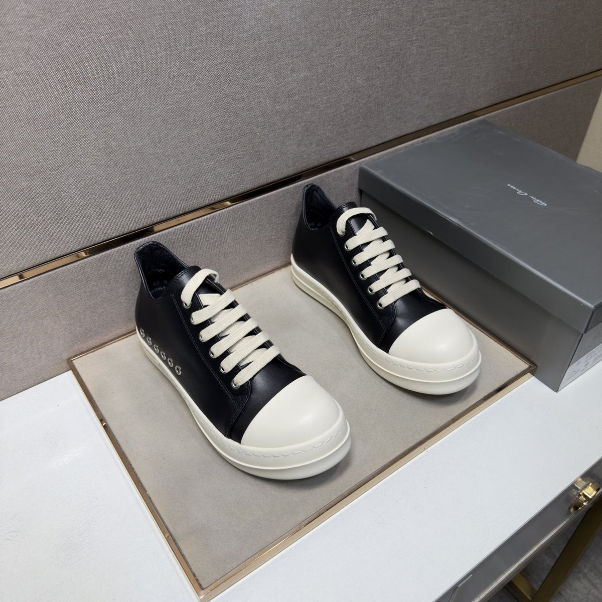 Black and Off-White Low-Top Sneakers — front