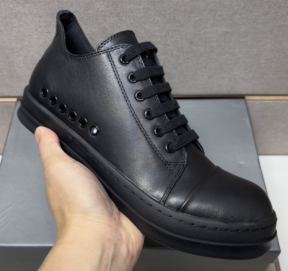 Black and Off-White Low-Top Sneakers — front