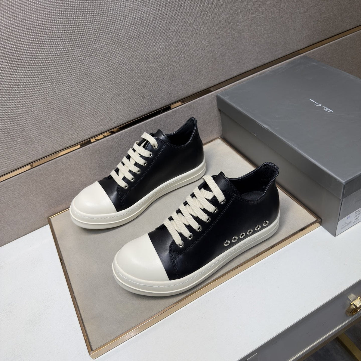 Black and Off-White Low-Top Sneakers — front