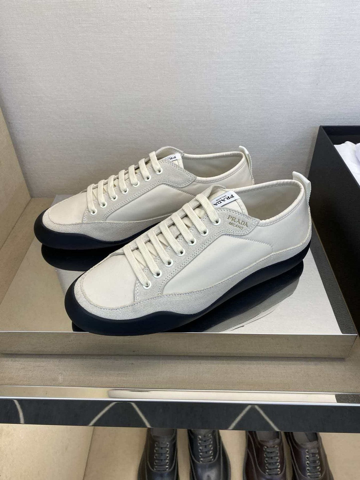 Prada Low-Top Leather Sneakers — side