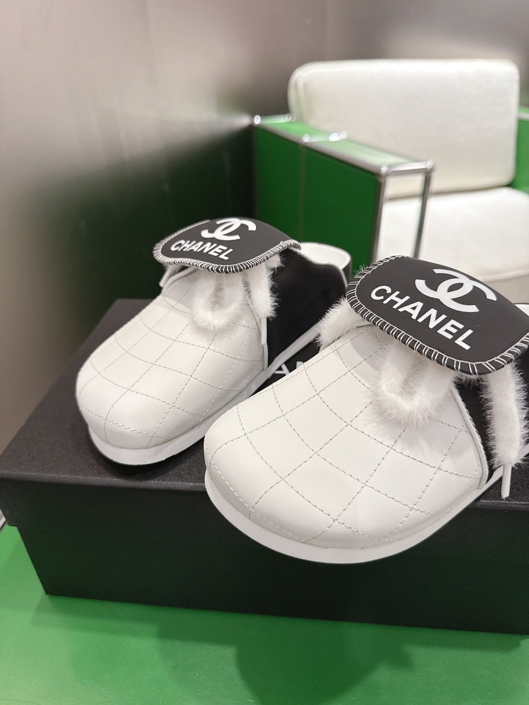 Chanel Quilted Closed-Toe Slip-On Shoes — front