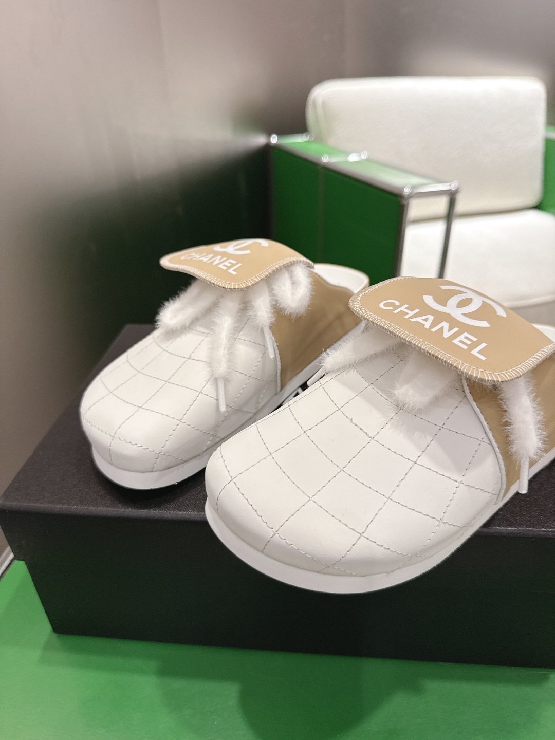 Chanel Quilted Closed-Toe Slip-On Shoes — front