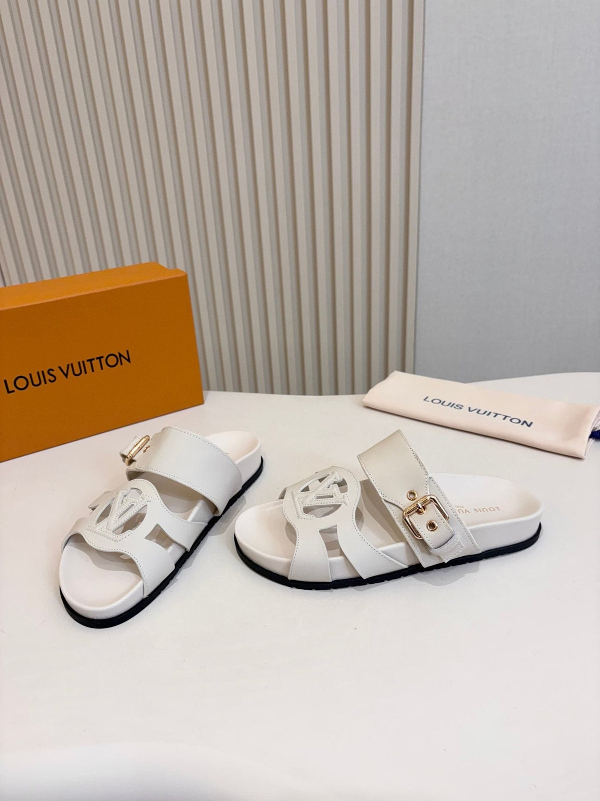 Louis Vuitton Cutout Buckle Slide Sandals — front