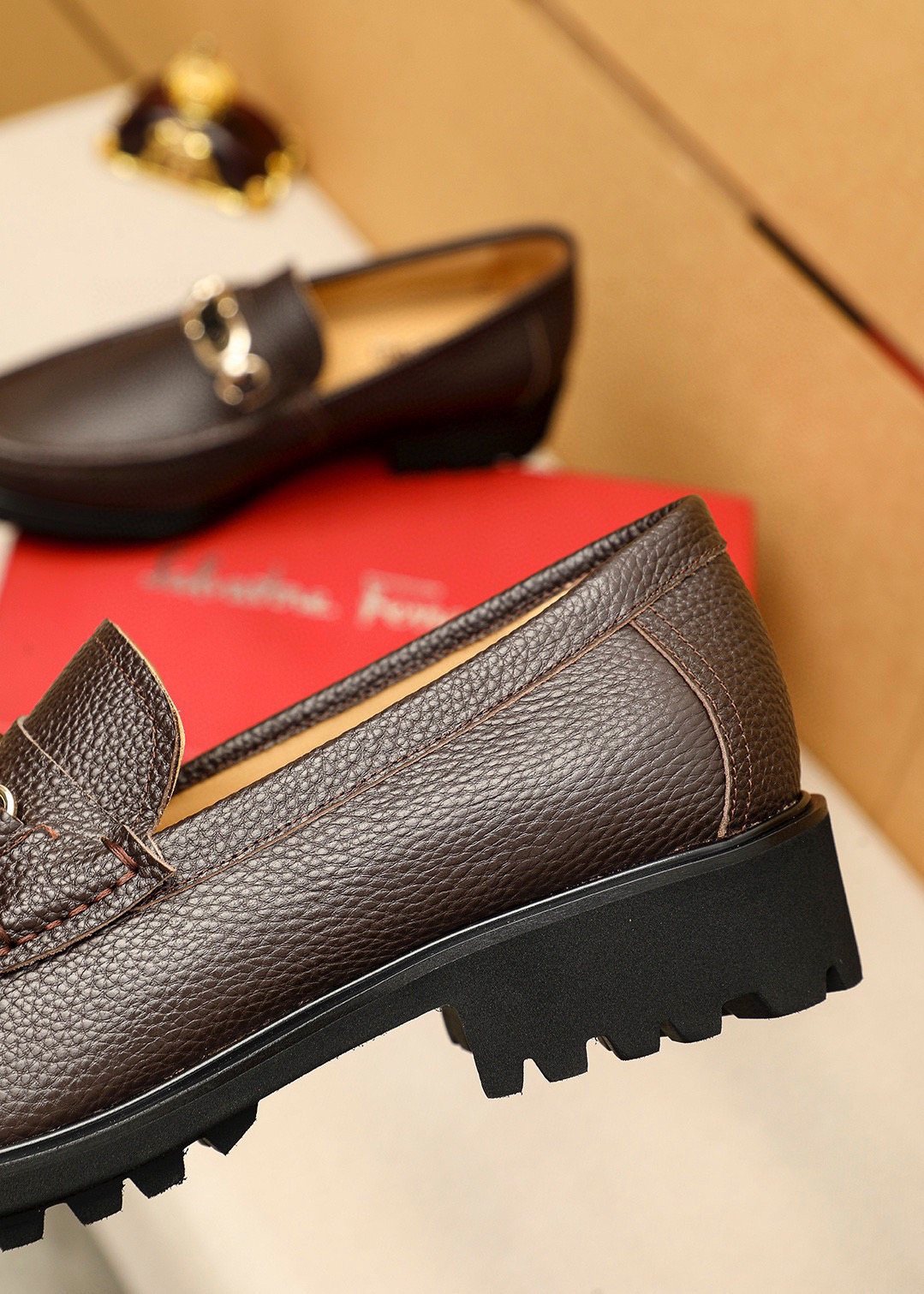 Ferragamo Pebbled Leather Lug Sole Loafers — detail