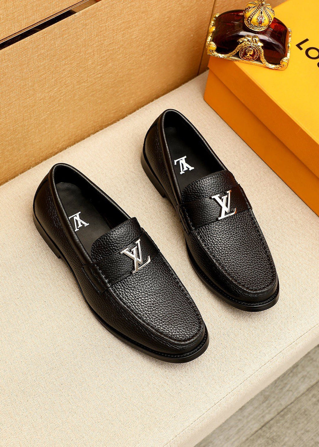 Louis Vuitton Textured Hardware Loafers — hero