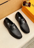 Louis Vuitton Textured Hardware Loafers — hero
