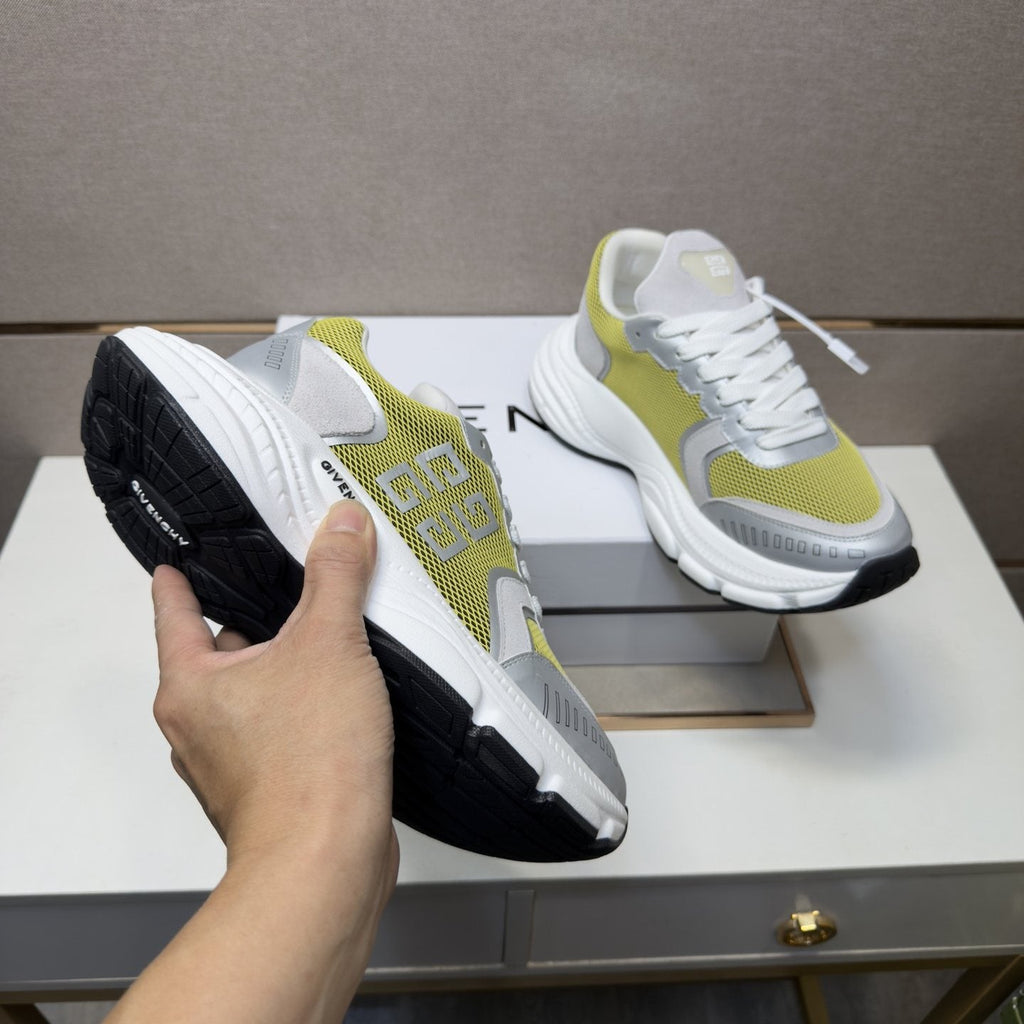 Givenchy Paneled Low-Top Sneakers — model