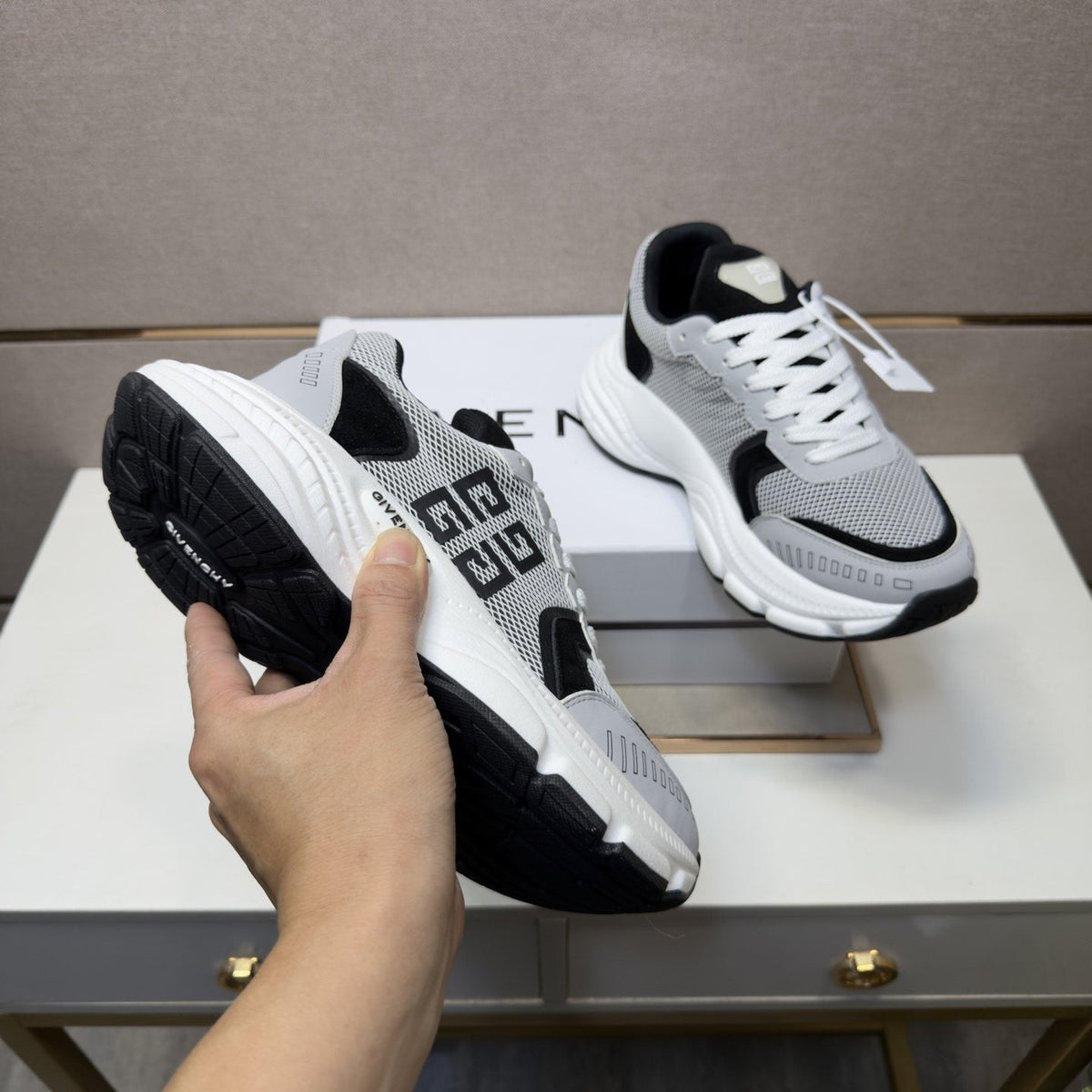 Givenchy Paneled Low-Top Sneakers — model