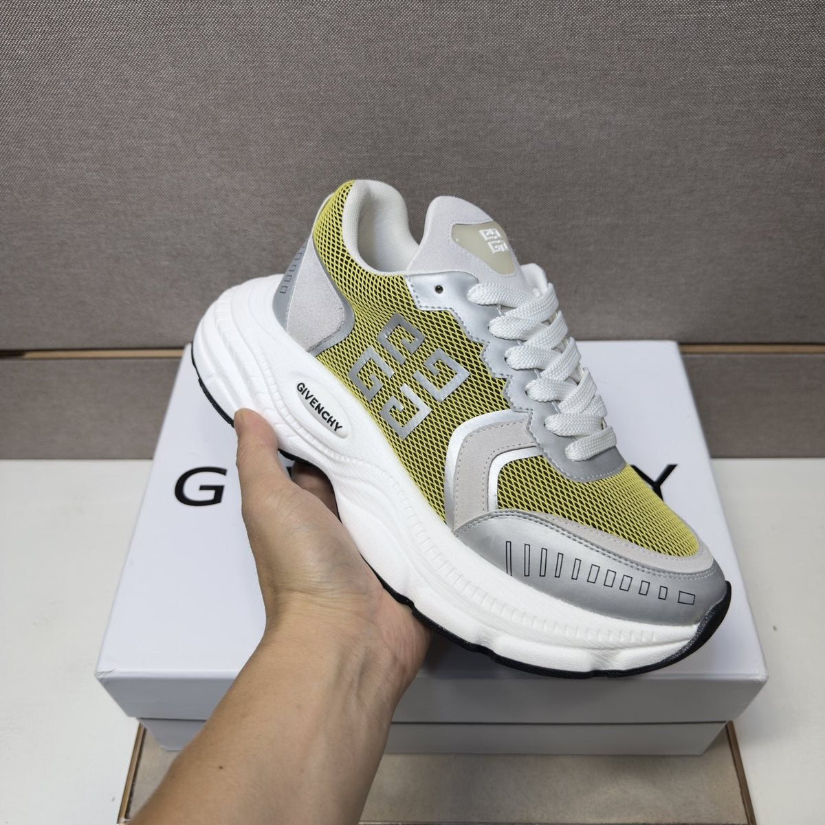 Givenchy Paneled Low-Top Sneakers — model