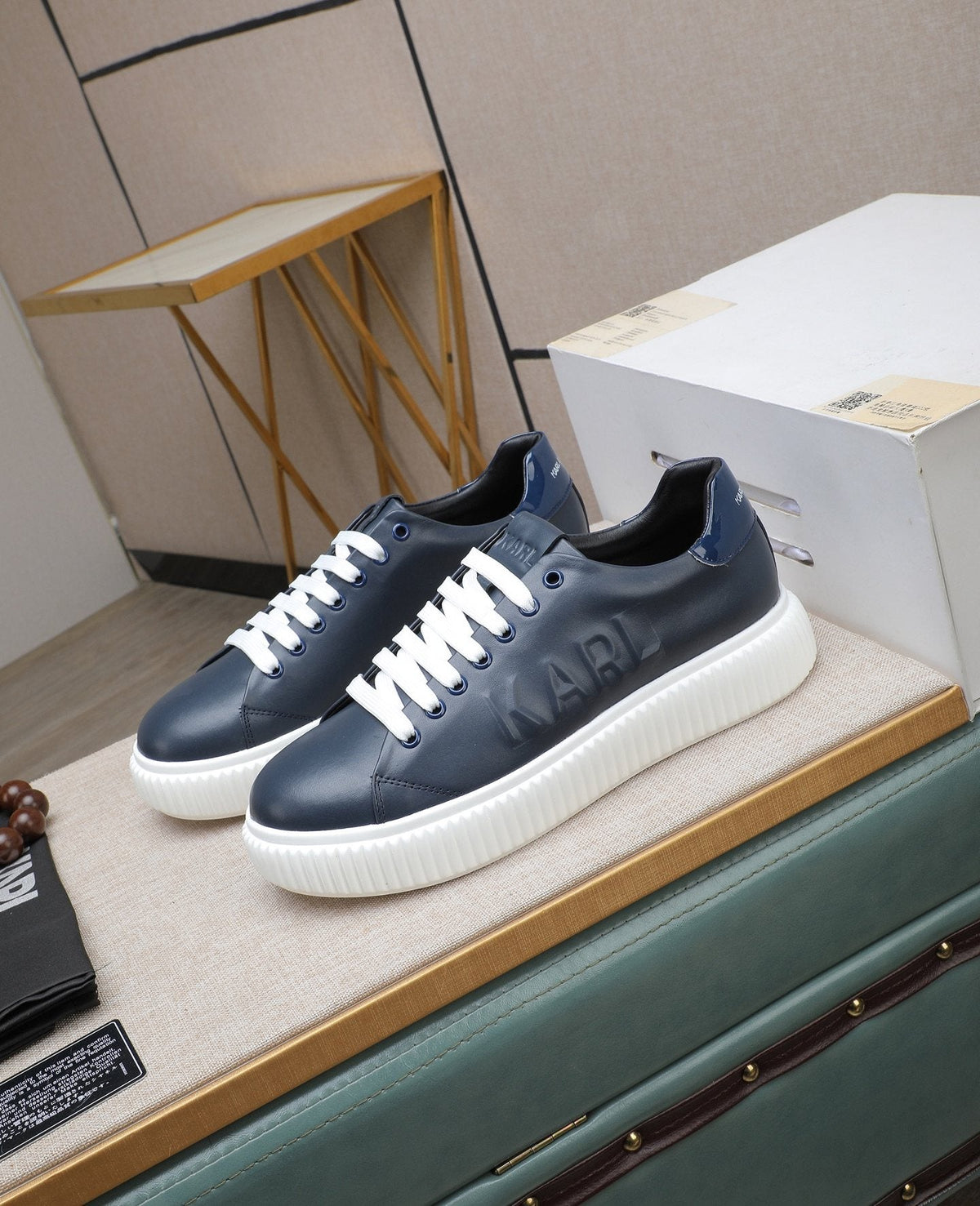 Karl Lagerfeld Embossed Logo Low-Top Sneakers — front