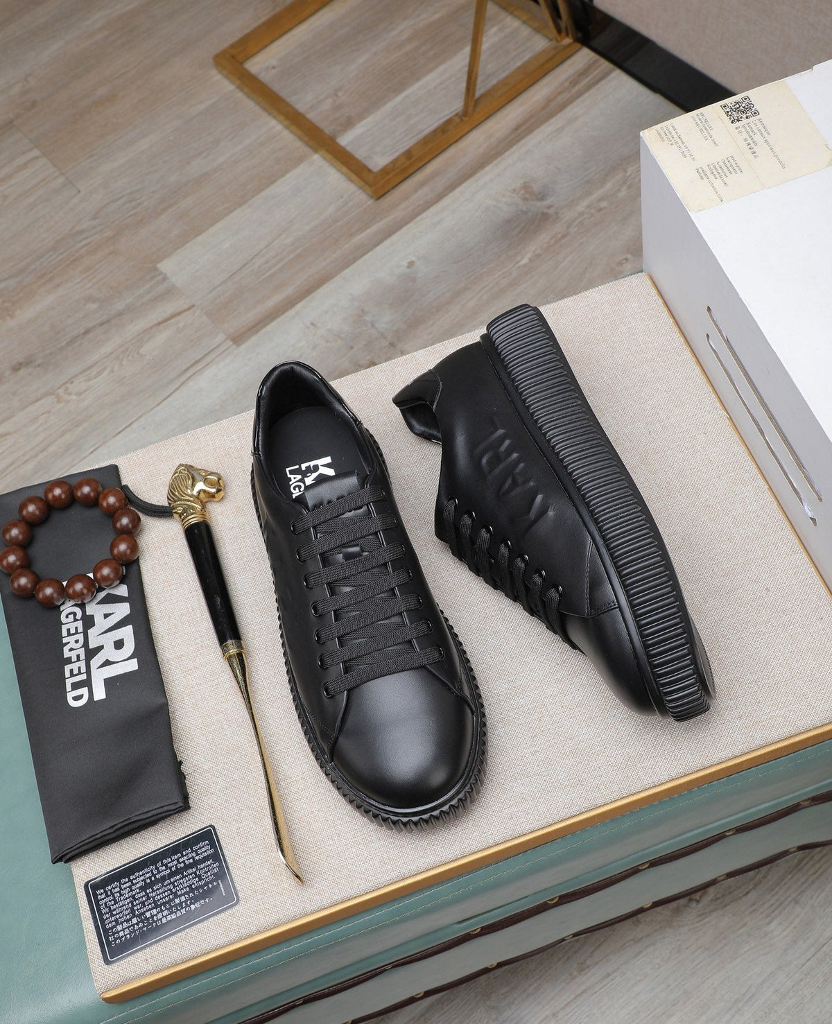 Karl Lagerfeld Embossed Logo Low-Top Sneakers — front