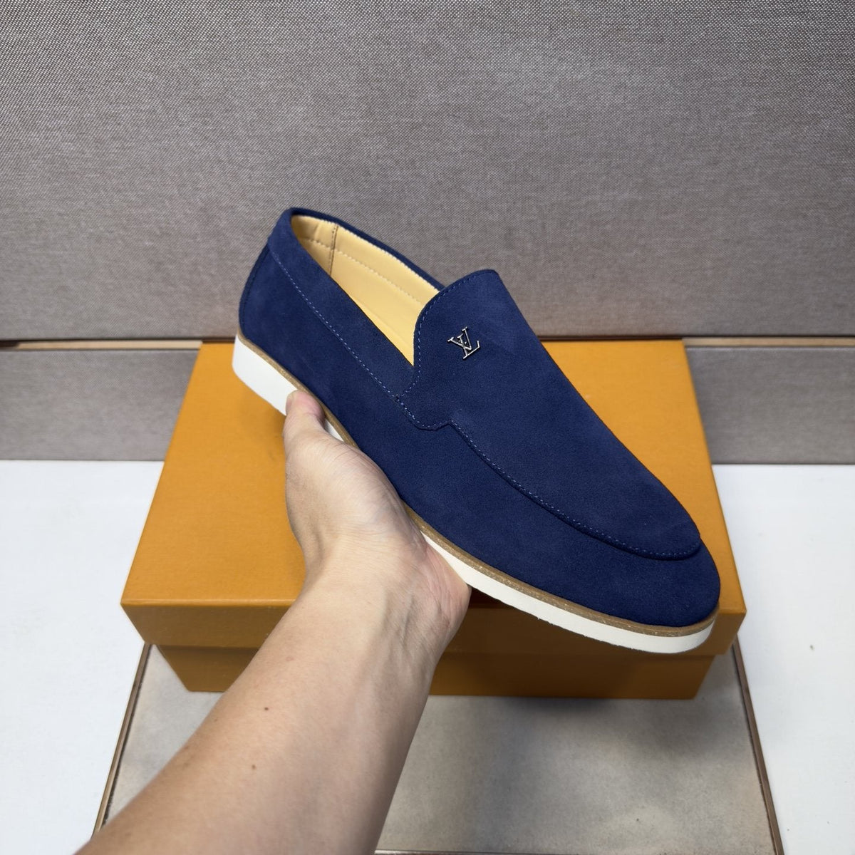 Louis Vuitton Men’s Textured Slip-On Loafers — model