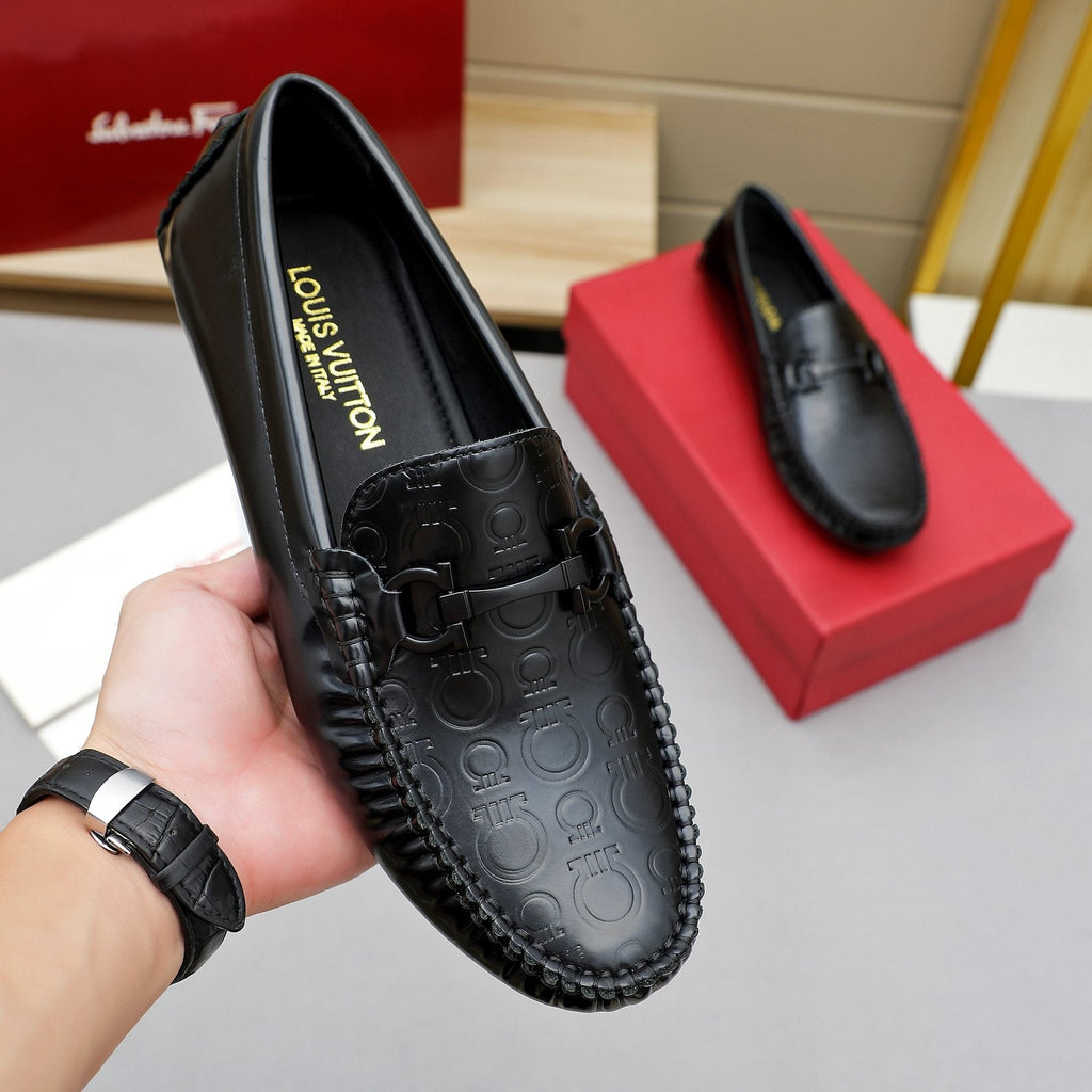 Ferragamo Metal-Bit Moc-Toe Loafers — model