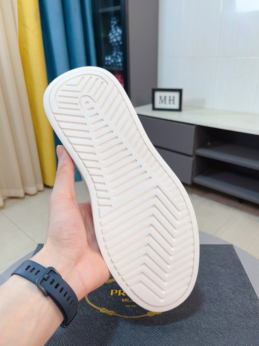 Prada Textured Slip-On Shoes — side