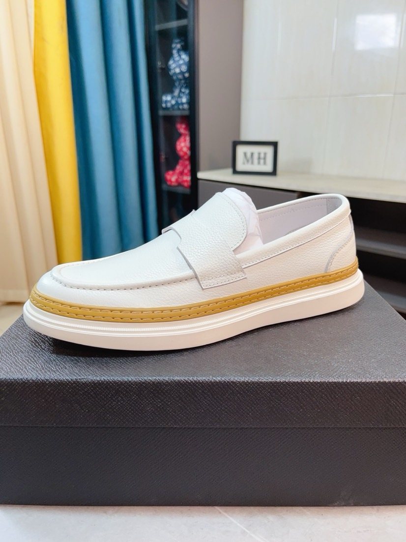 Prada Textured Slip-On Shoes — side
