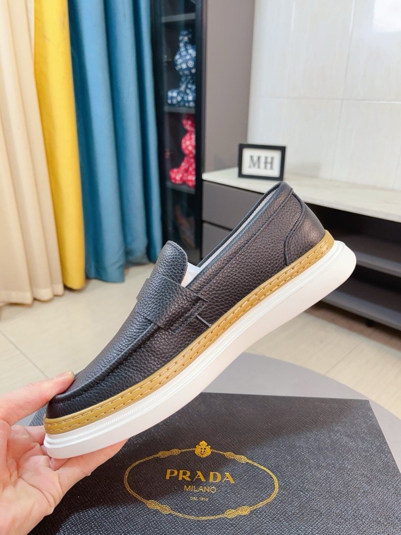 Prada Textured Slip-On Shoes — side
