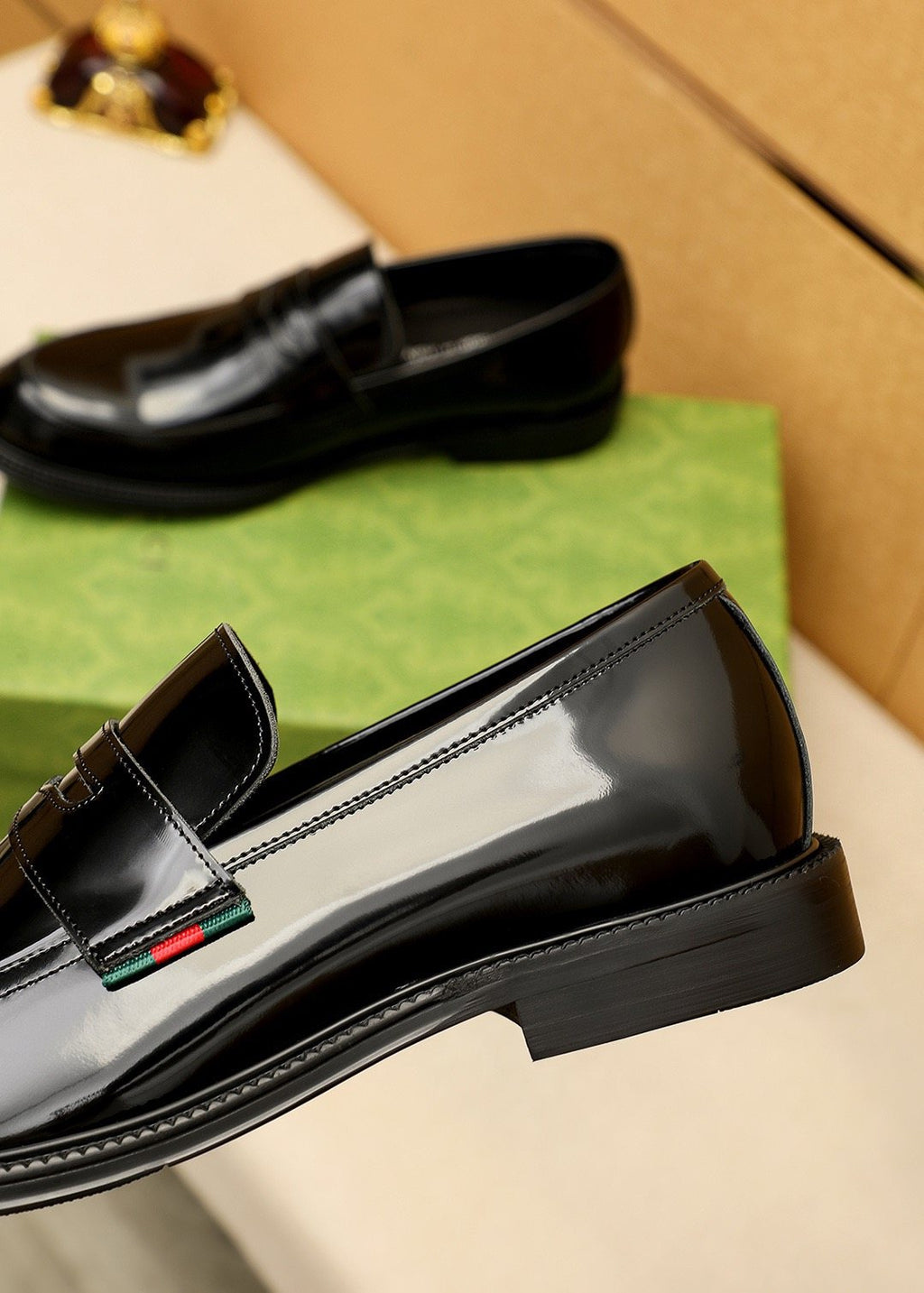 GUCCI Glossy Strap Loafers — detail