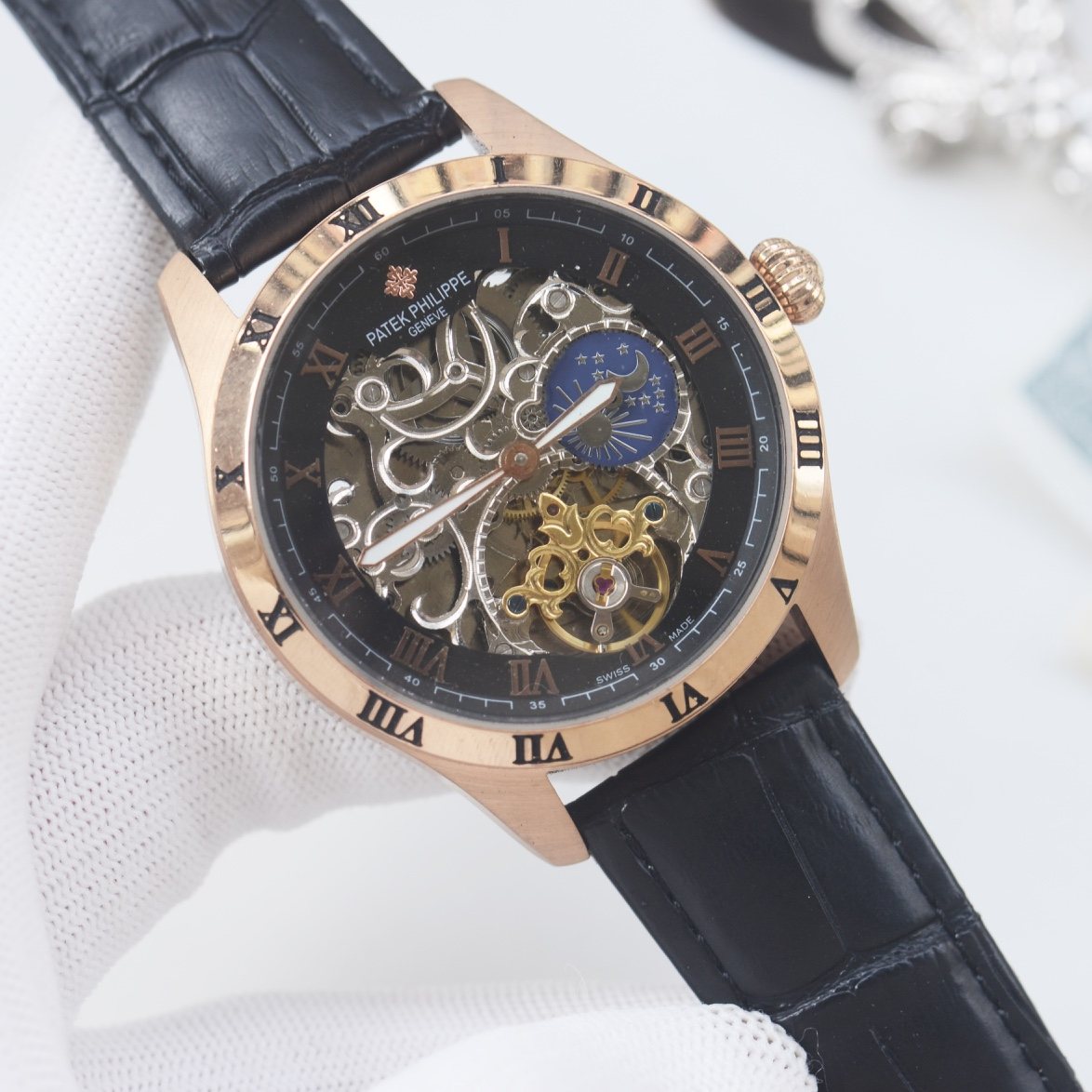 PATEK PHILIPPE Gold Black Strap Watch — hero