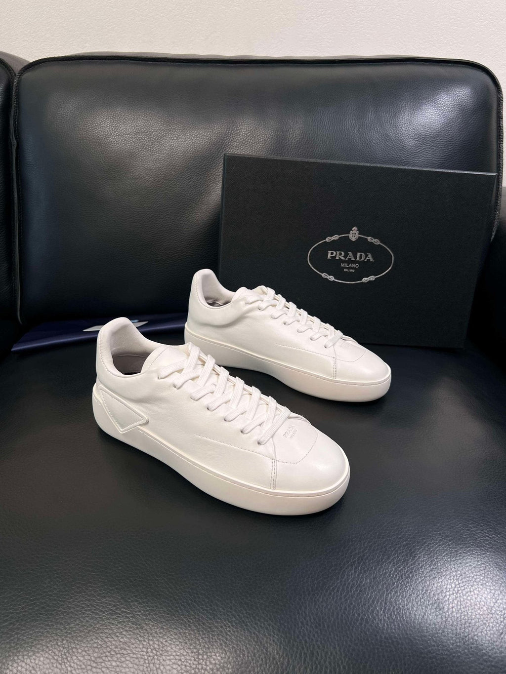Prada Low-Top Leather Sneakers — hero