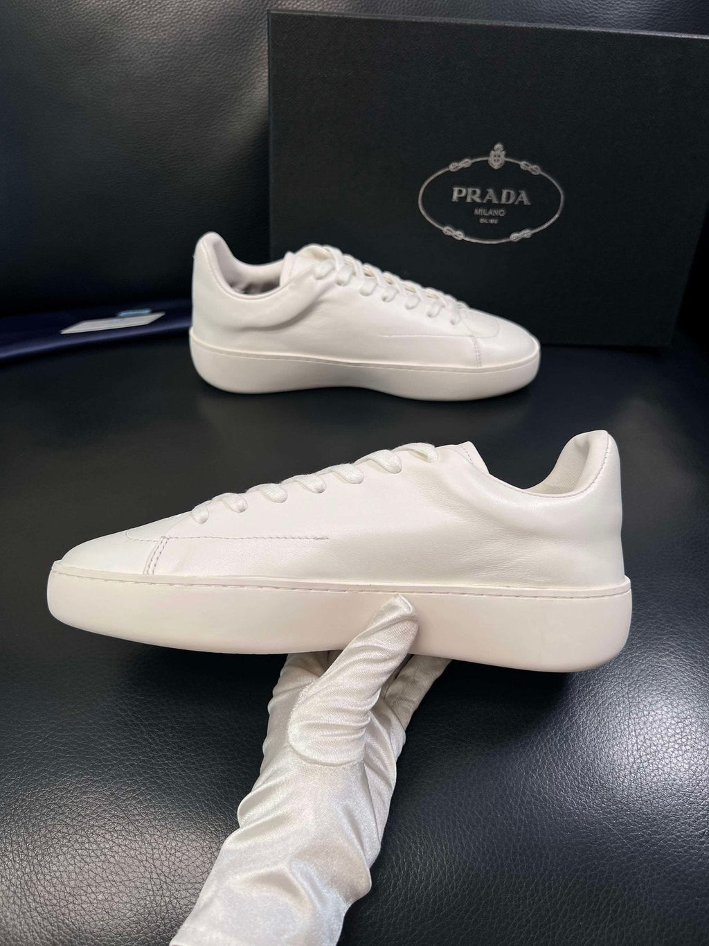 Prada Low-Top Leather Sneakers — model