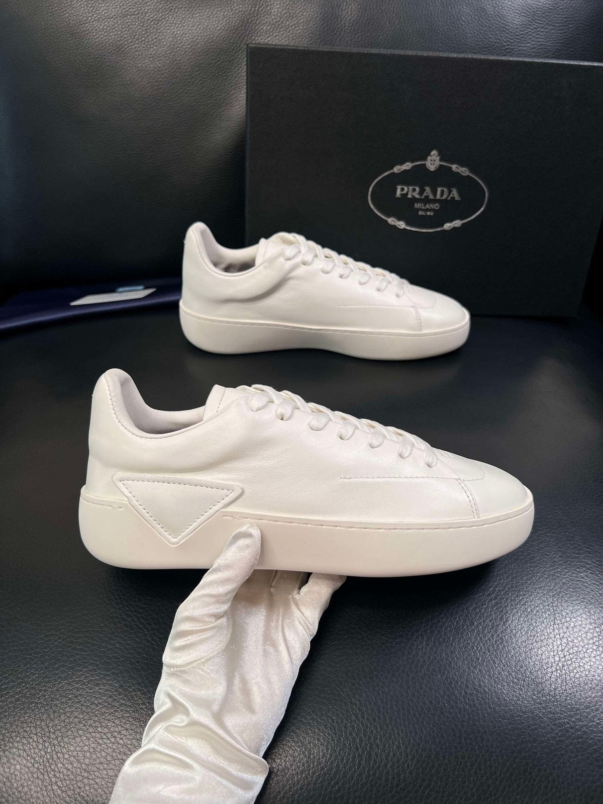 Prada Low-Top Leather Sneakers — model