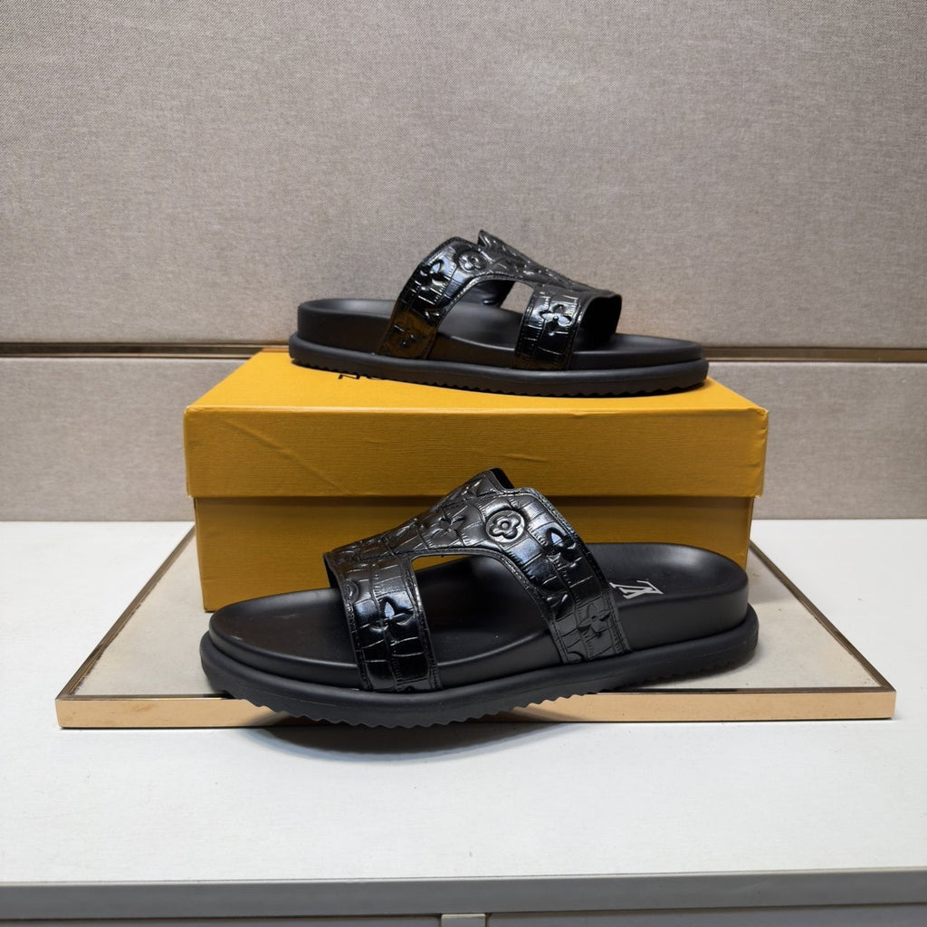 Louis Vuitton Textured Monogram Slide Sandals — front
