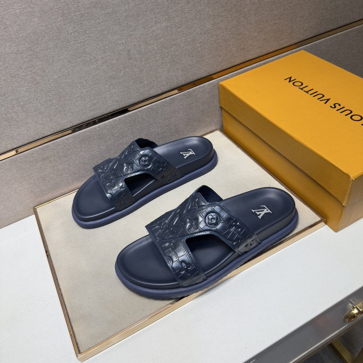 Louis Vuitton Textured Monogram Slide Sandals — front