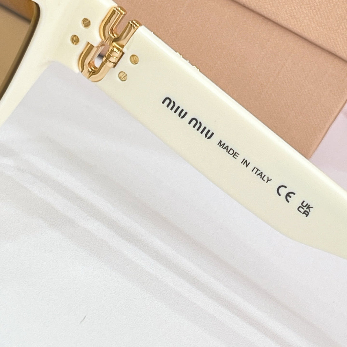 Miu Miu Sunglasses – MU C04S